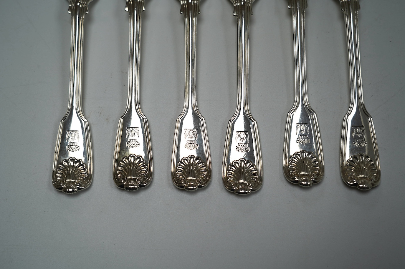 A set of six early Victorian silver fiddle, thread and shell pattern dessert forks, by Mary Chawner, London, 1838, 17.3cm, 12oz. Condition - poor to fair